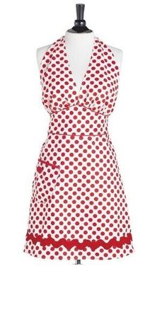 a white and red polka dot dress on a mannequin