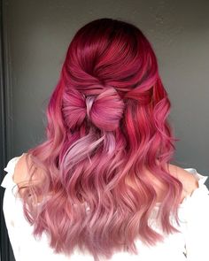 Gorgeous hair bow on pink ombre hair. Get ready for the holidays with these 10 gorgeous holiday hairstyles! From Christmas hair inspo to chic ponytails, curls, and festive hair ideas, these looks are perfect for any celebration. Whether you need last-minute glam or creative hair ideas, you'll love these trending styles! 🎀✨ #HolidayHairstyles #ChristmasHair #HairInspo #HairIdeas #FestiveLooks