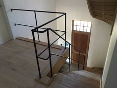 the stairs are made of wood and metal