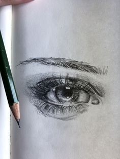 a pencil drawing of an eye