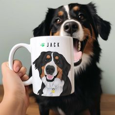 a person holding a coffee mug with a dog's face on it and his mouth open