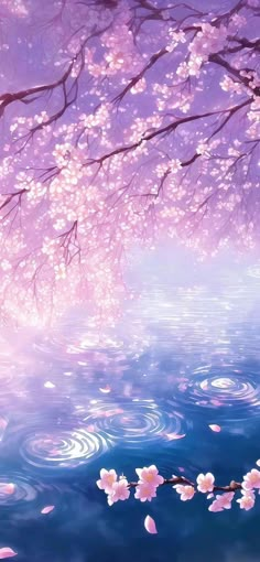 pink flowers are floating in the water near a tree with its blossoming branches on it