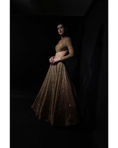 The High-Neck Golden Lehenga Set | Gold Lehenga Set | Bora Honey's – B Anu Designs Gold Embellished Lehenga For Reception, Bollywood Style Gold Embellished Sharara, Gold Embellished Sets With Traditional Drape, Gold Embellished Sets For Reception, Gold Embellished Anarkali Set For Reception, Gold Embellished Anarkali Sharara, Gold Embellished Choli For Reception, Festive Gold Embellished Lehenga, Gold Embellished Bollywood Sets