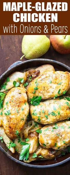 chicken with onions and pears in a cast iron skillet on a wooden table