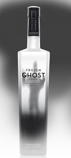 a bottle of frozen ghost vodka on a reflective surface