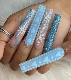 Extra long blue acrylic nails 
Winter  nails with heart and snowflake designs. Glitter nails Blue Christmas Nails, Blue Acrylic Nails, Drip Nails, Happy Nails, Pink Winter, Snowflake Nails