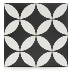 a black and white tile with circles on it