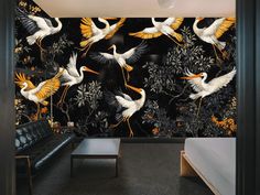 the wallpaper in this room is decorated with birds