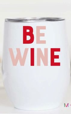 a wine glass with the words be wine printed on it