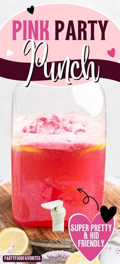 the pink party punch is in a glass jar