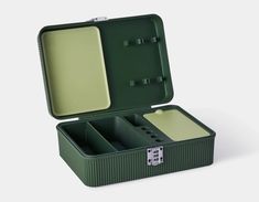 an open green box with two compartments on the inside and one compartment in the outside