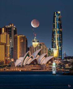 the moon is setting over sydney, australia