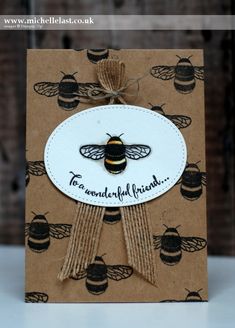 a card with a bee on it