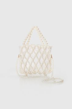 This eye-catching purse with ravishing beauty is the perfect to-go bag to any cocktail parties. It has its unique sparkle and will shine more brightly with you carrying it. Features: Durable inner bag Drawstring closure design Detachable pearl chain attached 9 inch / 20 cm x 7.1 inch / 18 cm ( L x H ) Headpiece Accessories, Rhinestone Headpiece, Womens Handbag, Bucket Purse, Crystal Bags, Beaded Evening Bags, Pearl Bag, Bridesmaid Accessories, Go Bags