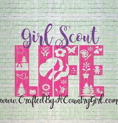 a pink and green wall with the words girl scout life on it's side