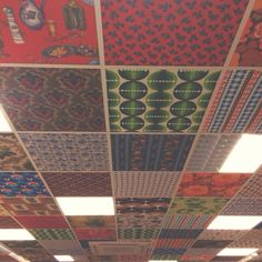 the ceiling is covered in many different patterns