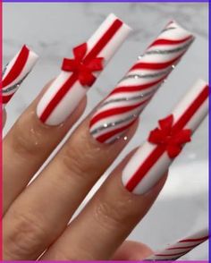 Deck the halls and your nails with the festive spirit of Christmas! This season, embrace the classic elegance of white, red, and silver with these gift-inspired nail designs. From dainty bows to shimmering ornaments, these designs will have you feeling holly and jolly all season long. #christmasnails #holidaynails #fall nails #christmas Candy Cane Christmas Nails Acrylic, Christmas Long Nail Designs, Fall Festive Nails, Acrylic Toes Christmas, Candy Cane Inspired Nails, All White Christmas Nails, Long Christmas Nails Acrylic, Halloween Nail Designs Red, Fall Coffin Nails 2024