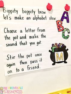 a bulletin board with writing on it that says happy b is for abc and letter m