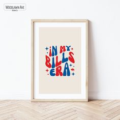 an art print with the words in my bills era printed on it, next to a white wall