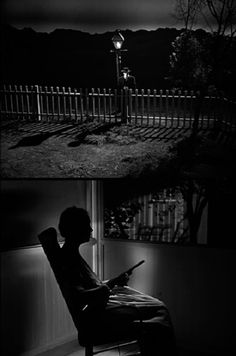 black and white images of a person sitting in a chair looking out the window at night