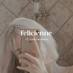 a woman taking a selfie in front of a shower with the caption felicienne