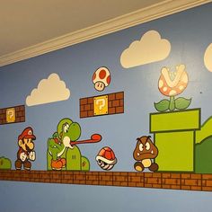 this is a wall mural in a child's room with mario and luigi on it