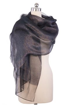 A sheer, shimmering scarf that will quickly become your go-to piece for going out. Bonus: it looks gorgeous as both a wrap and a scarf. 28" x 75" (one size) Pattern: Solid 100% silk Hand wash Imported Black Sparkly Scarf, Celestial Shawl, Dream Dresses, Scarf Material, Silky Dress, Silk Shawl, Fashion Marketing, Wrap Scarf, Silk Wrap