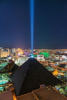 two beams of light shine over the las vegas strip