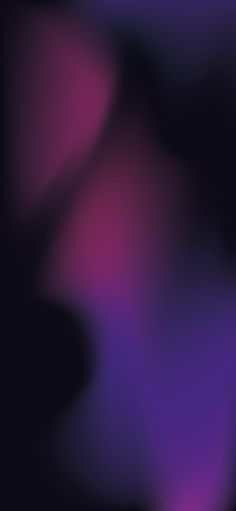 an abstract blurry background in purple and black