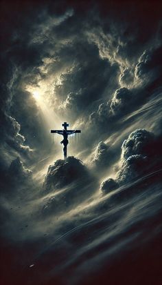 the crucifix is in the midst of dark clouds and sunbeams