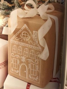 a brown bag with a gingerbread house on it