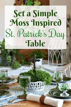 a table set for st patrick's day with moss on it and the words, set a simple moss inspired st patrick's day table