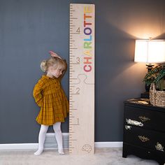 With this personalized, 5-foot growth chart, appreciating every moment of your child's growth becomes more special and more memorable. Every growth chart is custom created with your child's unique name! Toys.  Baby Toys & Gifts.  Personalized Items.  Playroom and Bedroom Furnishings. Wooden Ruler Growth Chart, Wooden Height Chart, Ruler Growth Chart, Wooden Growth Chart, Space Character, Wooden Ruler, Personalized Growth Chart, Growth Chart Ruler, Height Chart