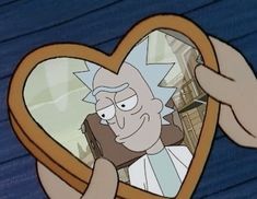 a cartoon character holding up a heart shaped mirror