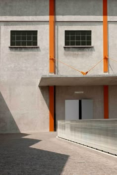 an orange and white building with two windows