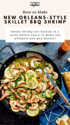 a skillet filled with shrimp and lemons on top of a blue table cloth