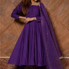 Featuring A Purple Anarkali In Cotton Base With Gota Lace Work. It Is Paired With Matching Cotton Pants And An Organza Dupatta. It’s Not A Kurta But There Was No Option For Anarkali/Frock Suit. Tags Attached But No Price Listed. The Top Does Have Padding. Can Be Worn On The Shoulder Or Off. My Pictures Are The Real Depiction Of The Color. The Stock Pictures Are A Bit Too Dark. Shoulder To Shoulder 15” Armpit To Armpit 18” Chest 35” Waist 16.50” Arm Length 23” Length Of Top 48” Cotton Anarkali Dress, Purple Anarkali, Anarkali Frock, Cotton Anarkali, Organza Dupatta, Anarkali Dress, Maroon Color, Cotton Pants, Anarkali