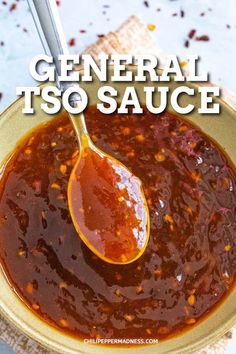 a spoon full of general tso sauce in a bowl with the words general tso sauce above it