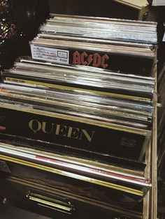 a stack of records sitting on top of each other