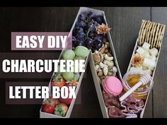 two boxes filled with different types of food and the words easy diy charcuterie letter box