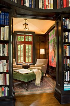 a living room filled with lots of books