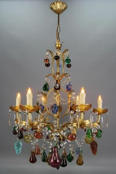 a chandelier with many different colored glass beads