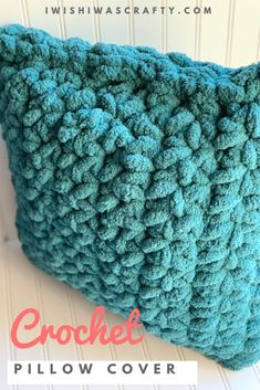 the crochet pillow cover is made with yarn