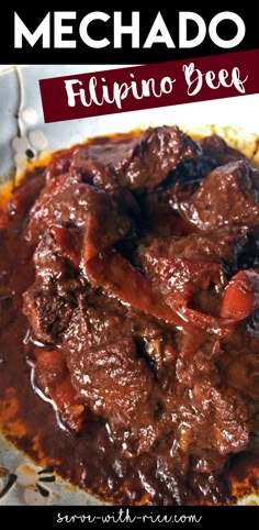 a close up of a plate of food with meat and vegetables in sauce on it