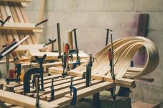 many different types of woodworking tools on a workbench