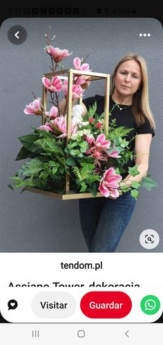 a woman holding a flower pot with pink flowers in it and the caption reads tendom pl