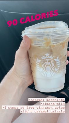 a person holding up a cup of coffee with the words 90 calories on it