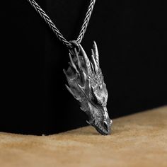 Handmade Dragon Head Sillver Men Necklace, Oxidized Silver Dragon Jewelry, Personalized Medieval Dragon Pendant, Gift For Husband Made of 925 silver and handcrafted by hand, this ring is not only an accessory piece that complements your daily elegance, but also has details that will reflect your character and style. It is also a great gift to give to your loved ones on their special days. At SavisSilver, we always give importance to the satisfaction of our customers, we recommend you to read the Medieval Style Silver Necklaces For Fantasy Events, Medieval Style Metal Jewelry For Fantasy Events, Medieval Style Metal Necklaces For Larp, Fantasy Engraved Jewelry For Fantasy Events, Antique Silver Medieval Jewelry With Oxidized Finish, Medieval Jewelry In Antique Silver With Oxidized Finish, Silver Viking Jewelry For Fantasy Events, Hand Forged Silver Medieval Jewelry, Hand Forged Medieval Silver Jewelry