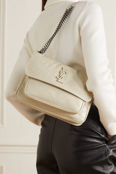 White Niki medium crinkled glossed-leather shoulder bag | SAINT LAURENT | NET-A-PORTER Rose Black Pink Ysl, Ysl Kate Bag Beige, Luxury Purses Ysl, Baby Niki Ysl, Ysl Niki Baby Bag, Ysl Niki Bag Baby, Ysl Niki Bag Medium, Ysl White Bag, Ysl Niki Bag Outfit