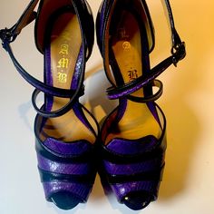 Size 9. Worn Maybe A Handful Of Times. Look Brand New. Originally $495. Designer Purple Leather Heels, Luxury Purple Heels With 4-inch Heel, Purple Heels With Leather Sole For Formal Occasions, Purple Heels With Leather Sole For Formal Events, Formal Purple Heels With Leather Sole, Purple High Heel Shoes With Leather Sole, Purple High Heels With Leather Sole, Purple Leather Party Heels, Chic Purple Leather Heels